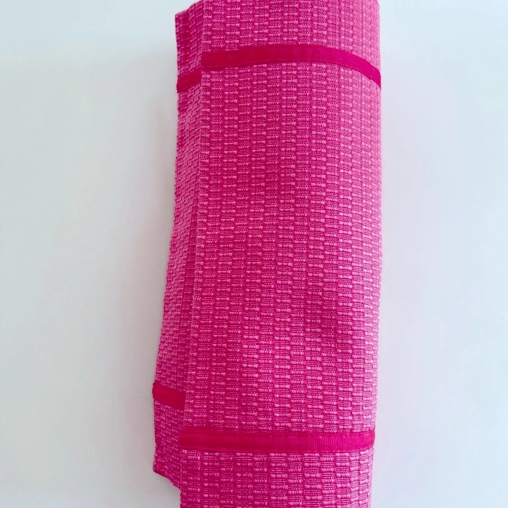 Set of four pink placemats with pink ribbon